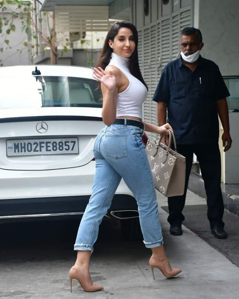 Nora Fatehi Looks Stunning in Tee and Denim 12 fb img 16077832529396498931601545832375